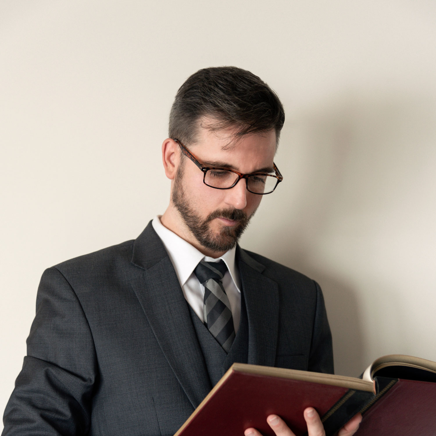 man-in-suit-reading-a-from-a-large-hardcover-book-2022-11-14-06-43-37-utc.jpg man-in-suit-reading-a-from-a-large-hardcover-book-2022-11-14-06-43-37-utc.jpg